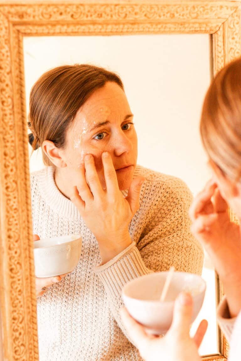 Applying the face mask with our fingertips.