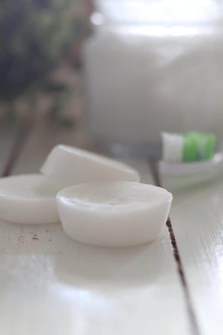 Close up of hardened coconut oil pulling melts ready to use.