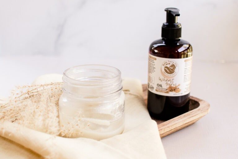 Wheat germ oil on a wooden tray.