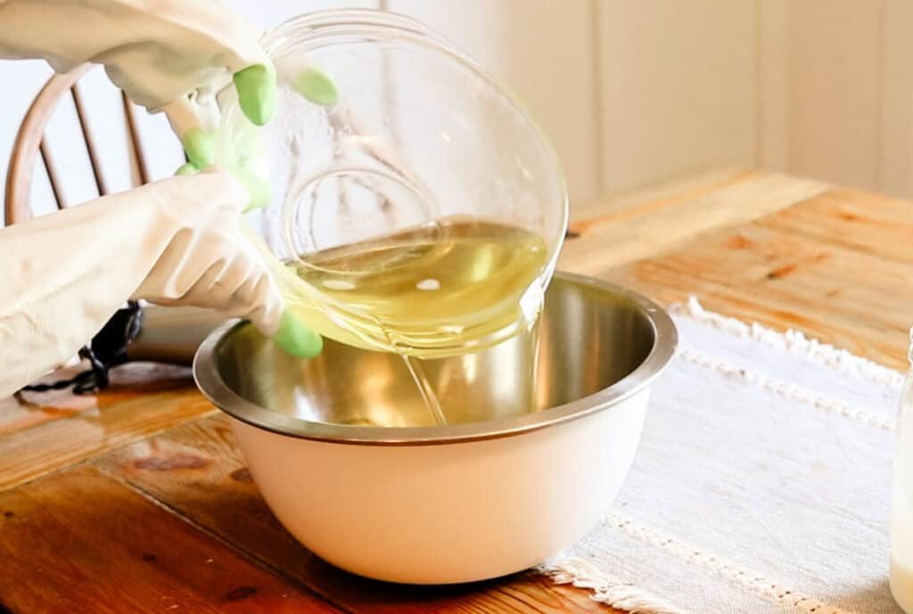 Melted oils and fats for the coconut milk soap recipe.