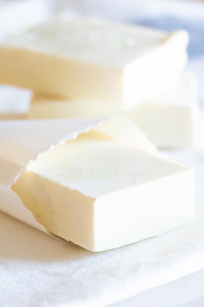 cold-pressed soap bars with chamomile essential oil in white pouch