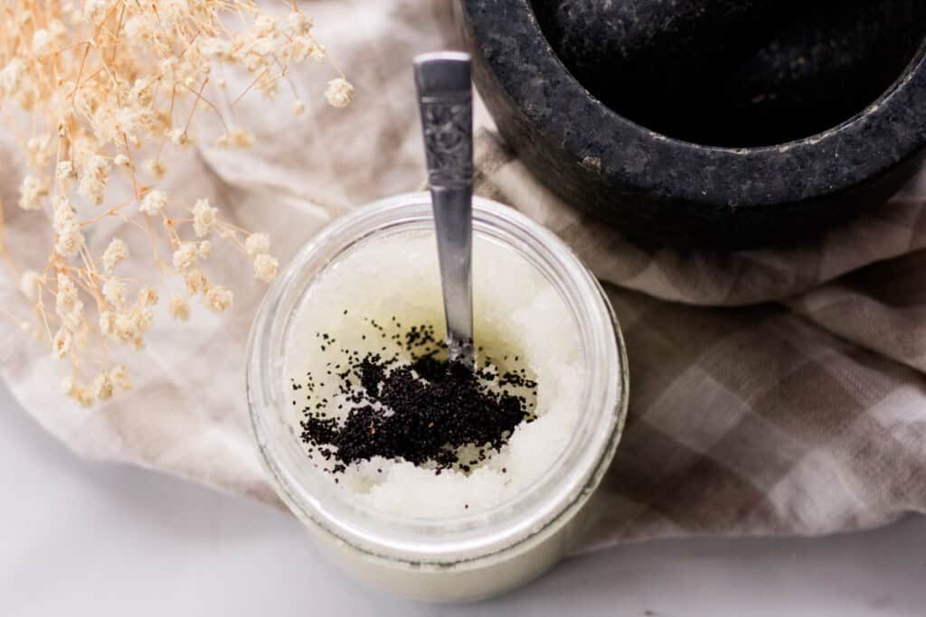 Poopy seeds in a jar of sea salt scrub.