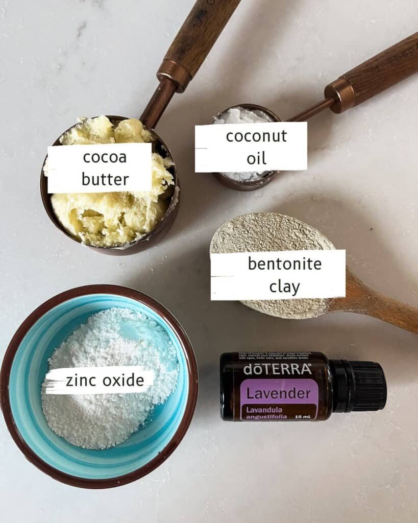 DIY diaper cream ingredients labeled on a white backdrop.