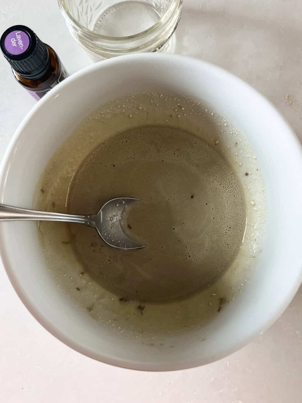 DIY diaper cream ingredients melted in a bowl.