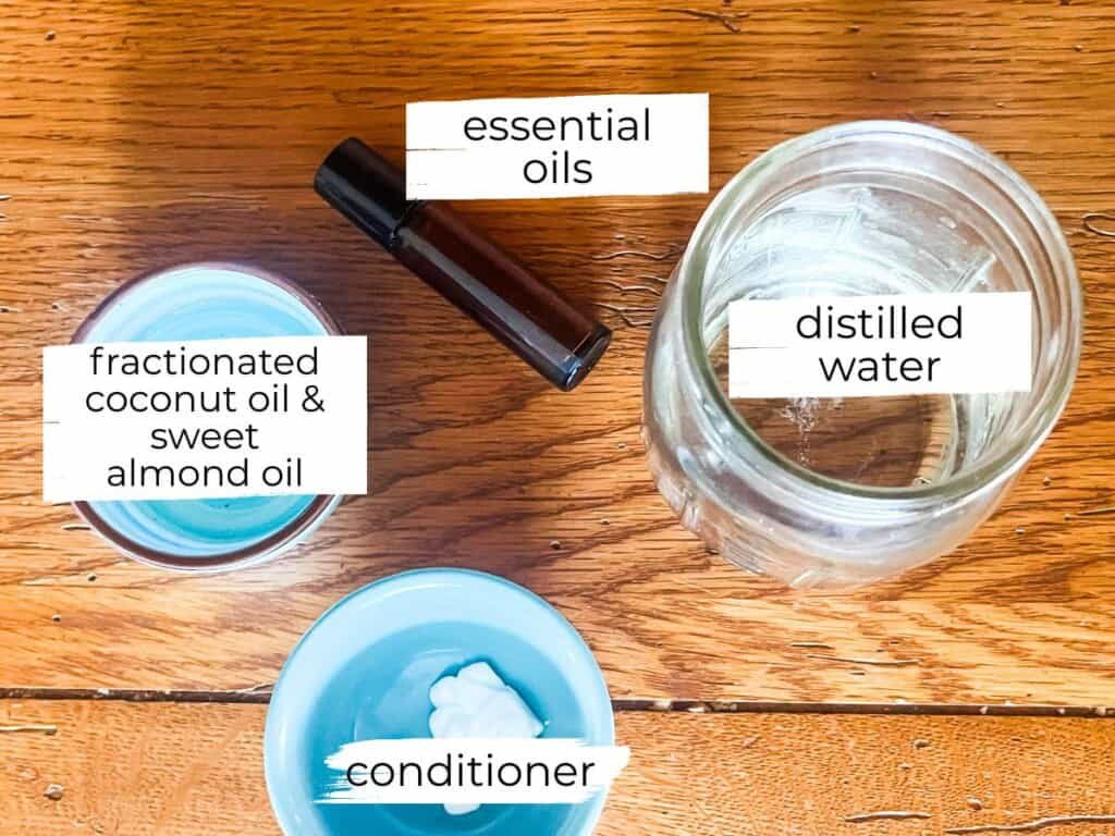 Hair heat protectant ingredients labeled on a wooden table.