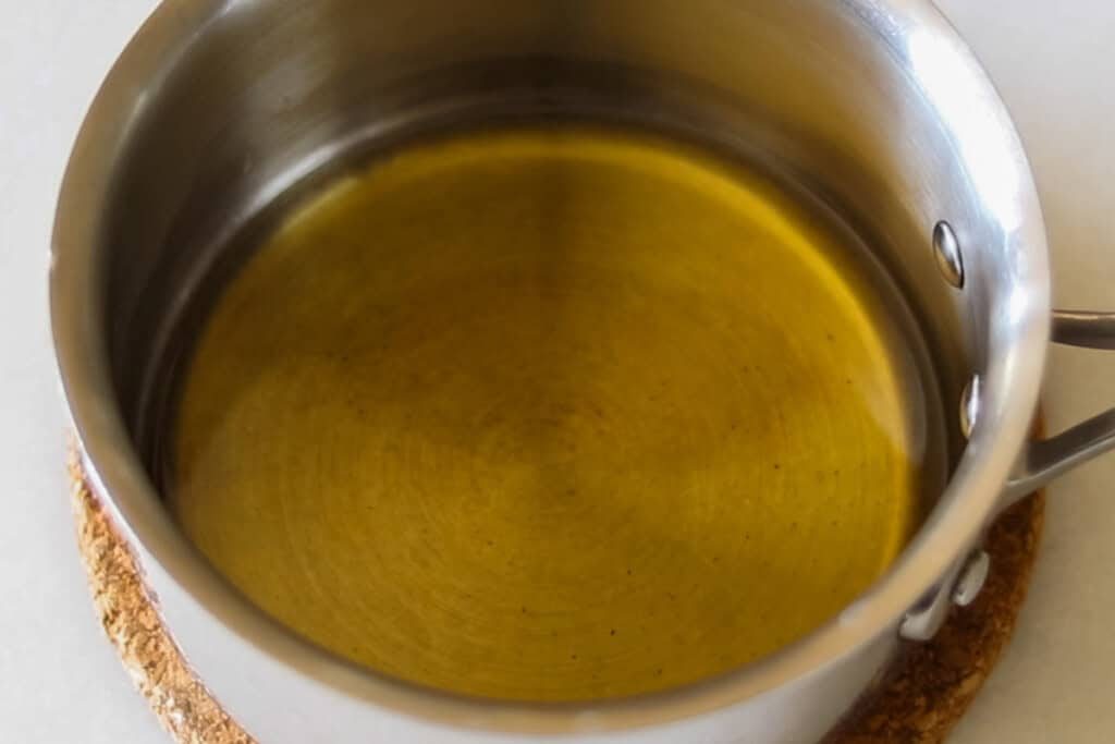 Melted oils and butters in a small saucepan.