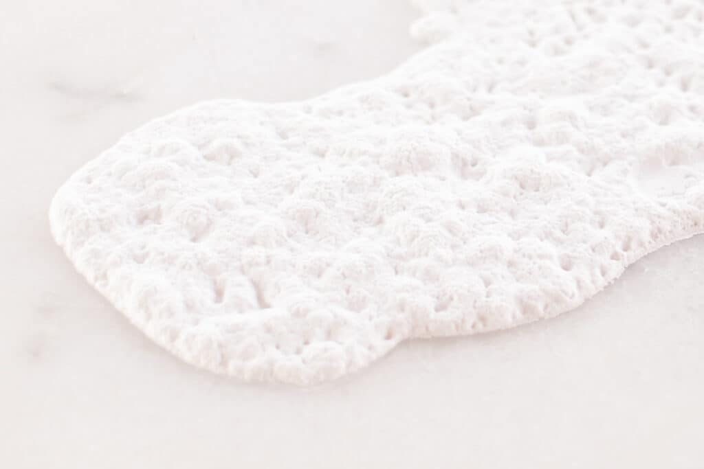Letting baking soda paste dry on a white marble surface stain.