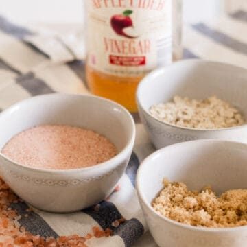 3 different scalp scrubs in separate bowls.