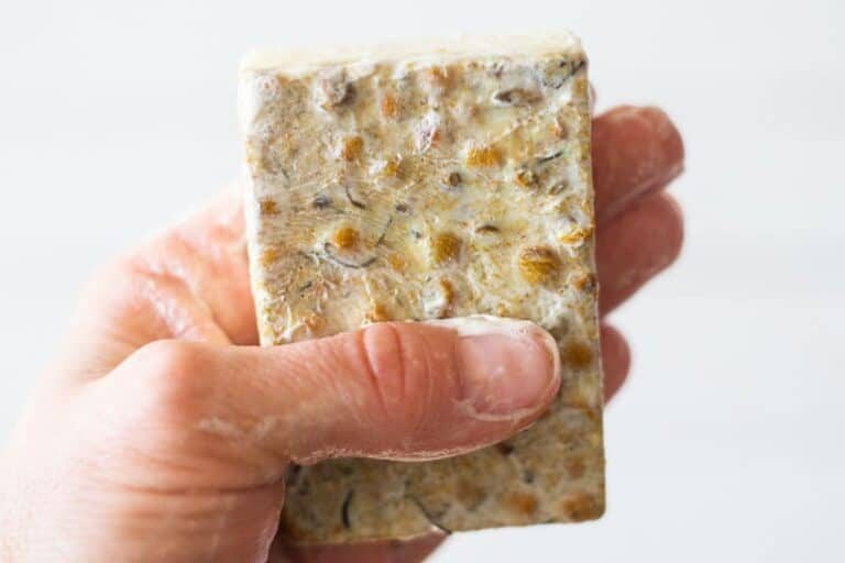 hand holding wet melt and pour soap bar