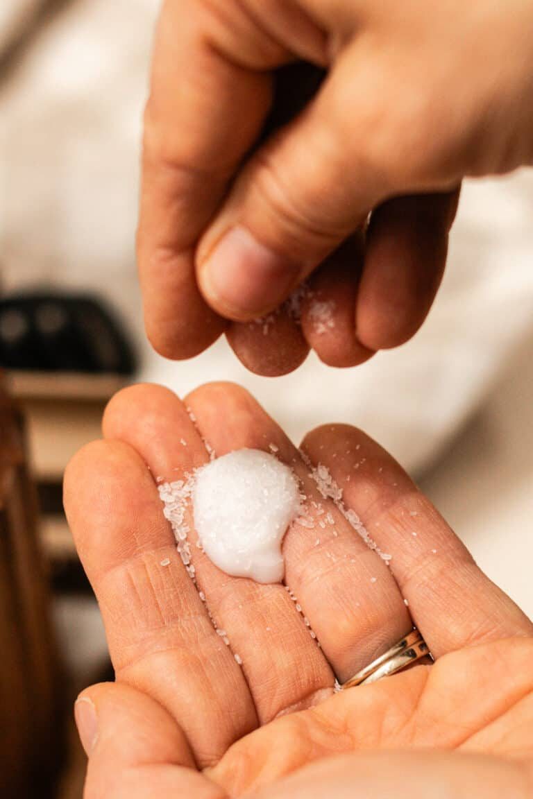 Mixing the epsom salt with the shampoo right in our hands.