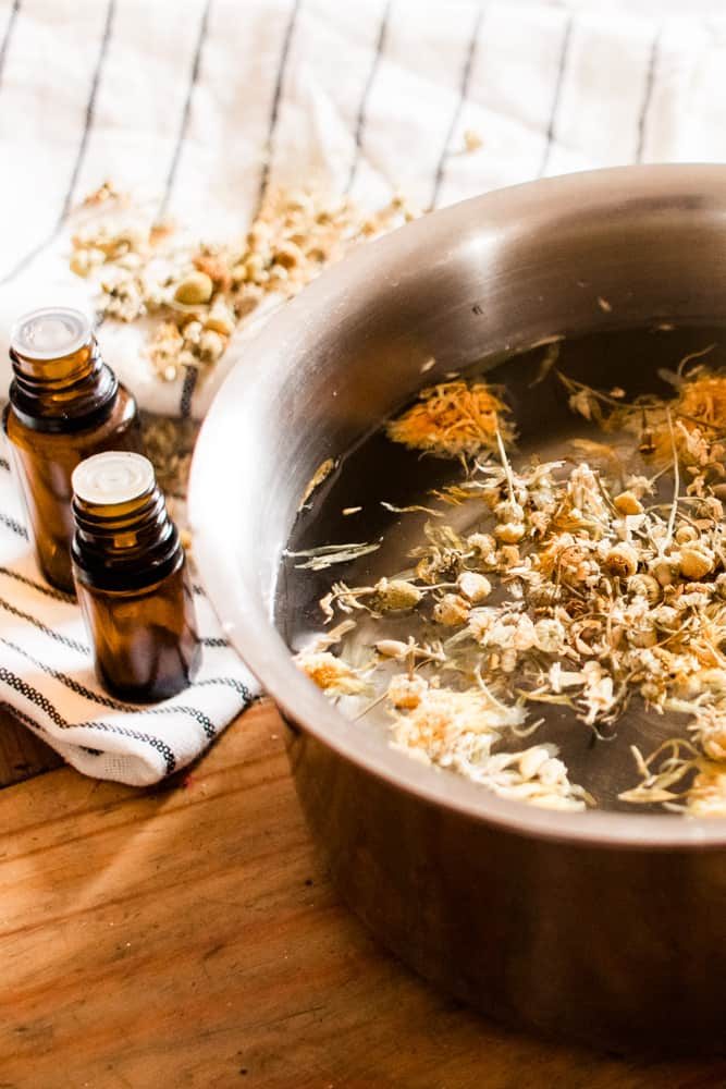 Pot of water for steaming the face with herbs and essential oils.