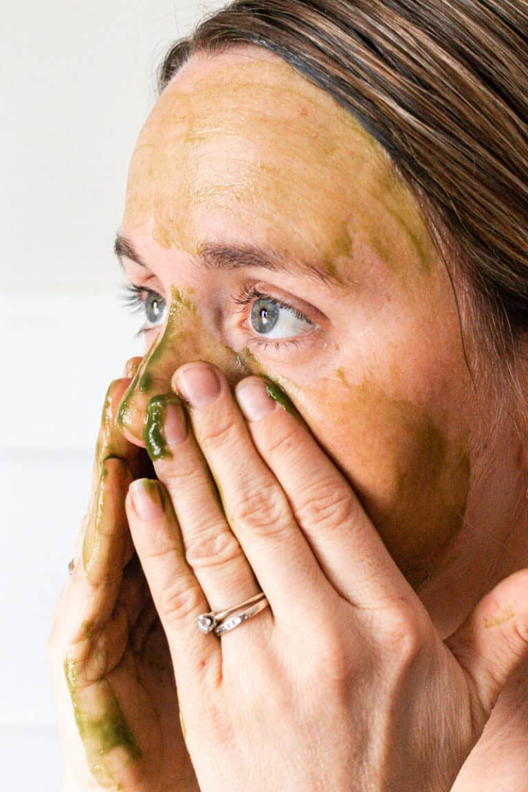 Applying face cleanser gel.