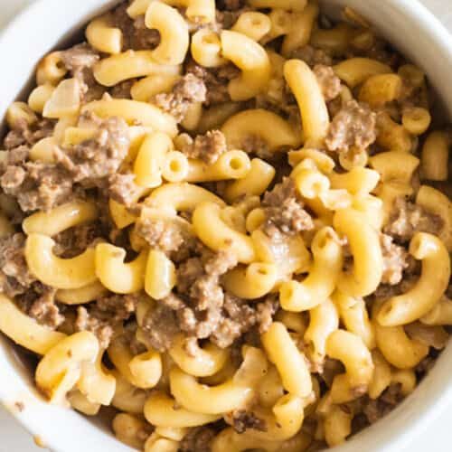 A white bowl filled with gluten-free hamburger helper.