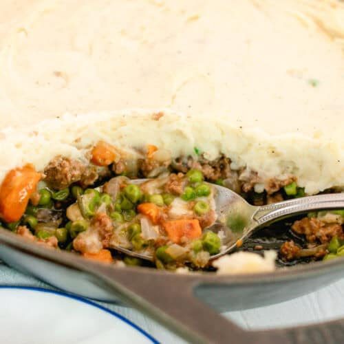 A gluten-free shepherd's pie in a cast iron skillet.