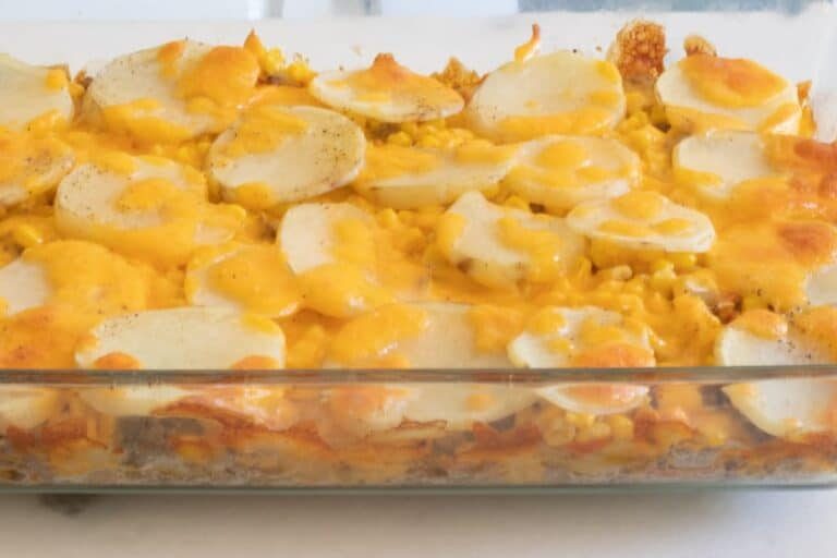 9 by 13 glass dish filled with hamburger potato casserole