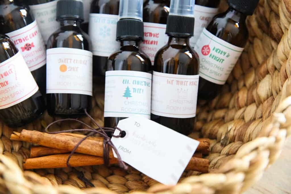 A basket of holiday room spray bottles.
