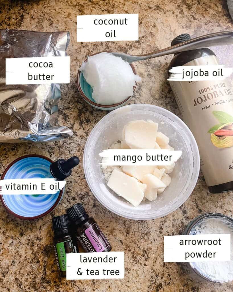 Ingredients for homemade body butter on a kitchen counter labeled.