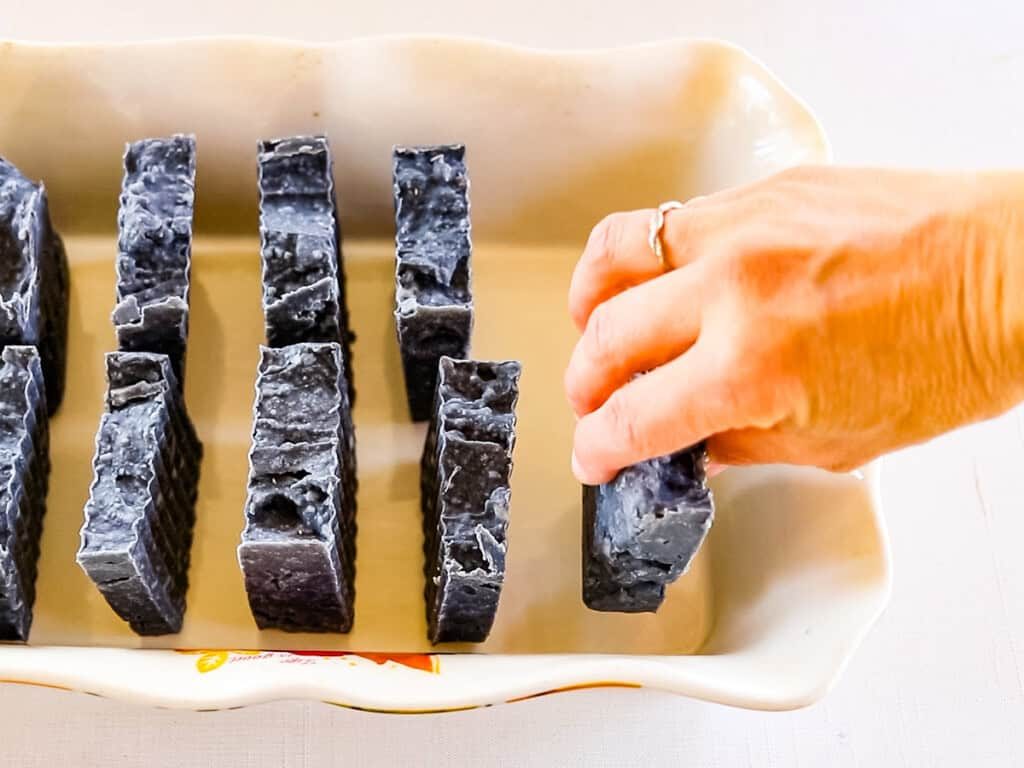 Standing up bars of soap with space between them to cure.