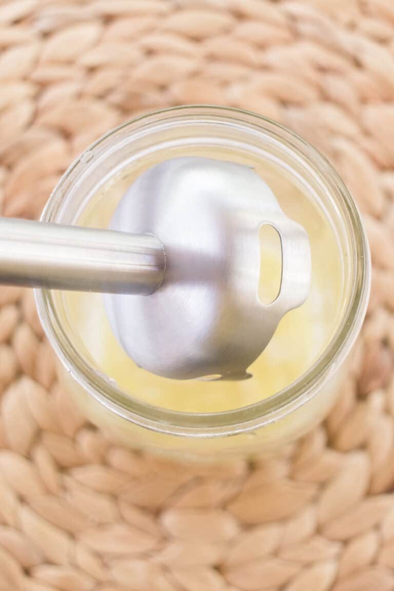 Using a immersion blender to emulsify the conditioner ingredients.