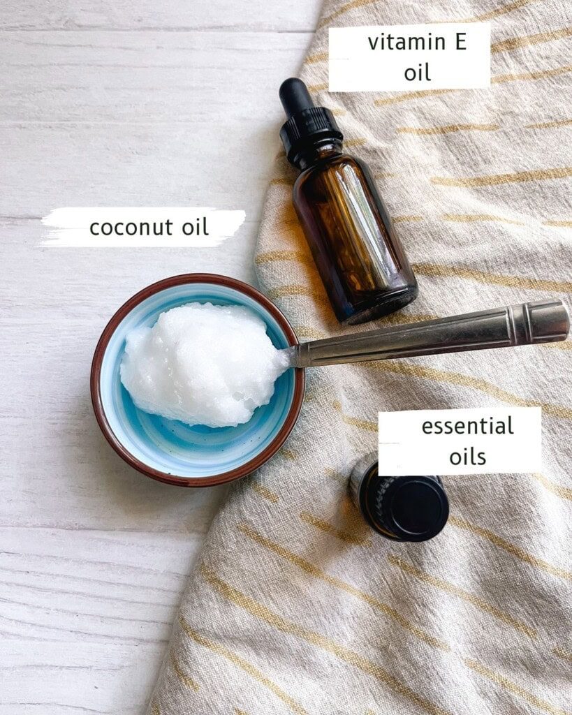 Homemade eye cream ingredients labeled on a white table.