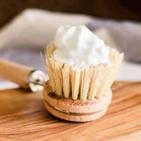 Homemade shaving cream on a brush.