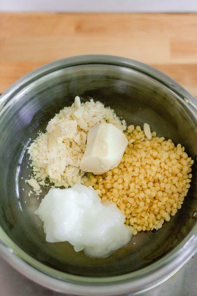 Lotion bar ingredients melting in a double boiler.