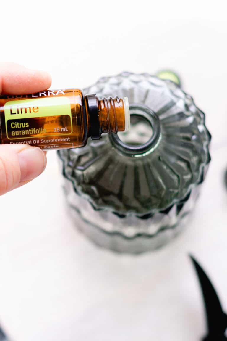 Adding more fragrance to the homemade room spray.