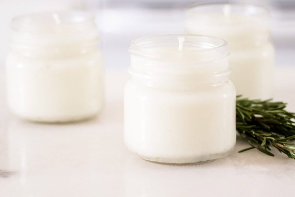 Three rosemary mint soy candles.