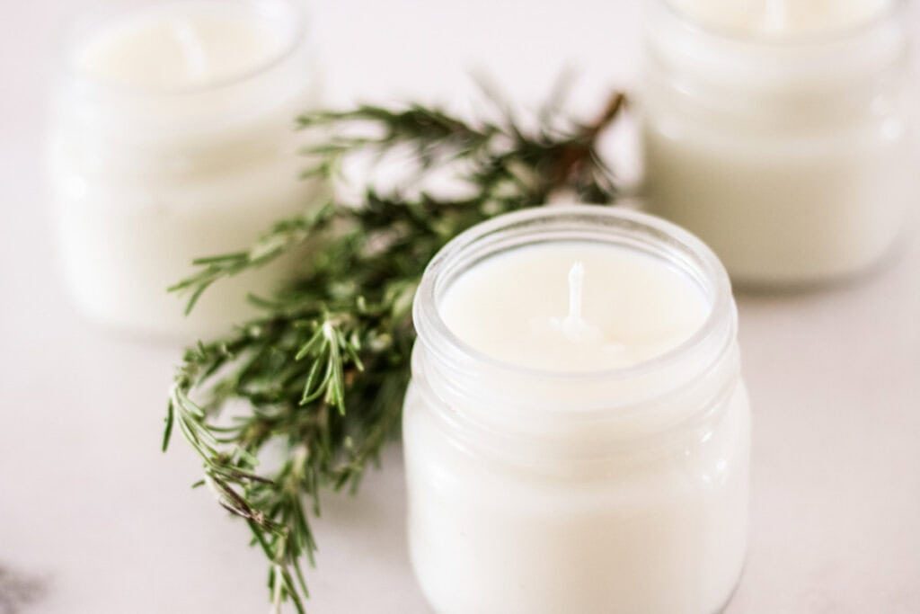 Rosemary mint soy candles and evergreen cuttings.