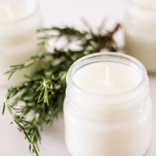Rosemary mint soy candles and evergreen cuttings.