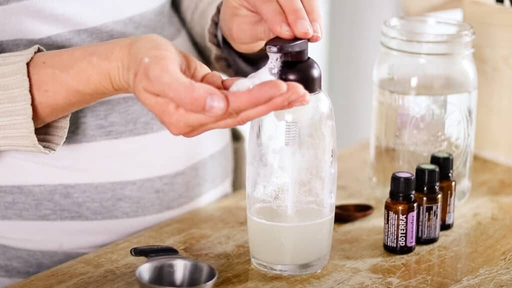 Dispensing the shampoo into our hands.