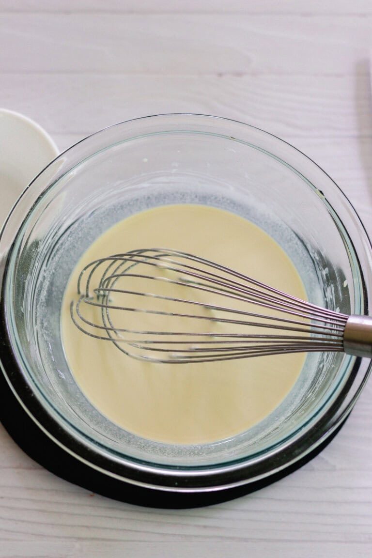 Adding in the non nano zinc oxide and whisking it in with a metal whisk.