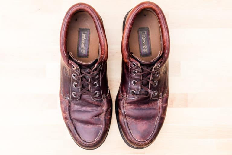 Leather shoe care polish freshly used on brown leather shoes.