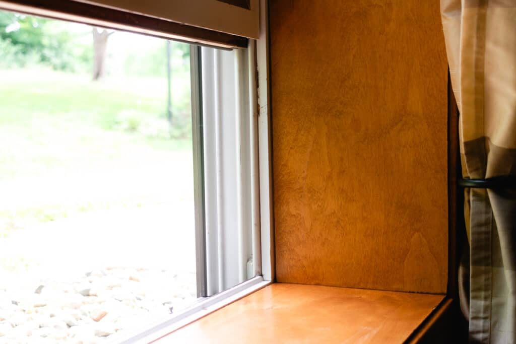 An open window and wooden window sill.