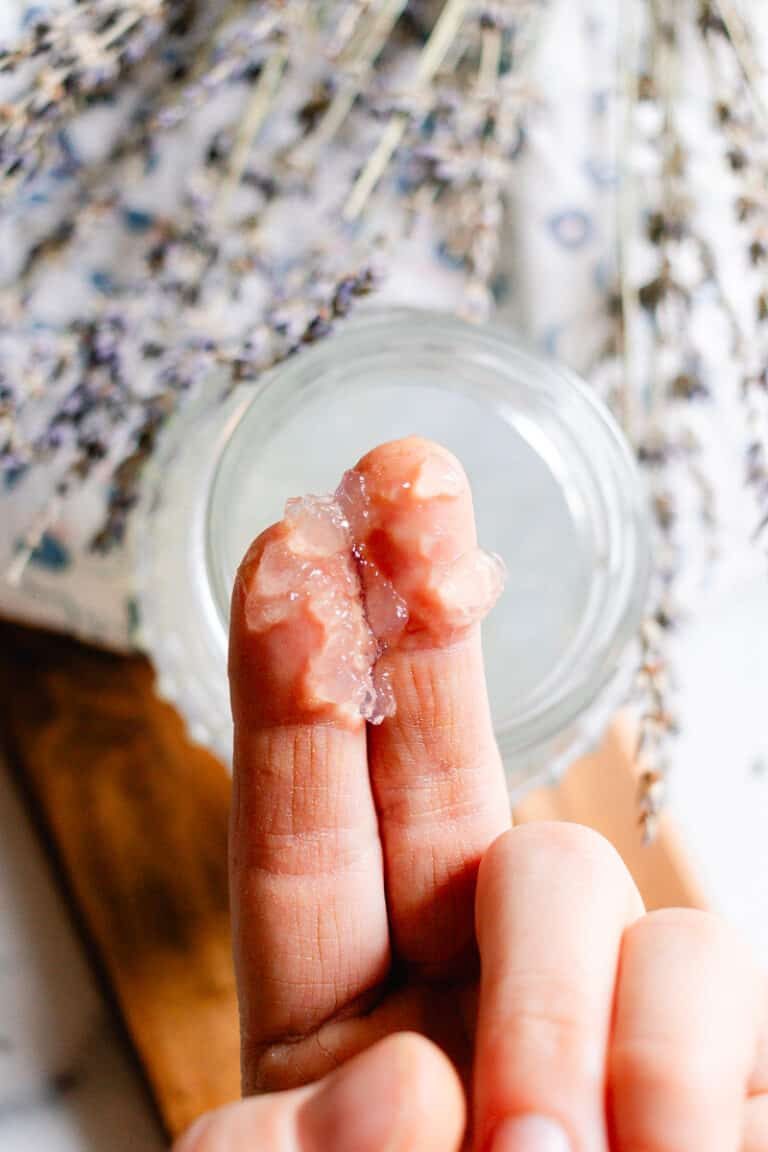 Scooping the hair gel onto our finger tips.