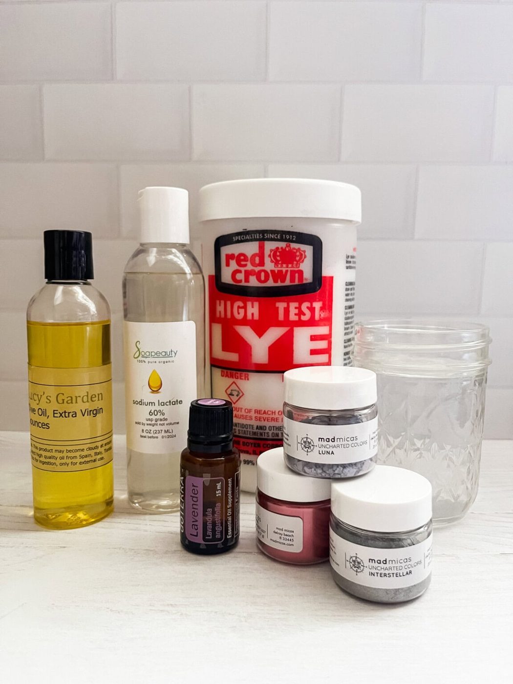Olive oil soap ingredients on a kitchen counter.