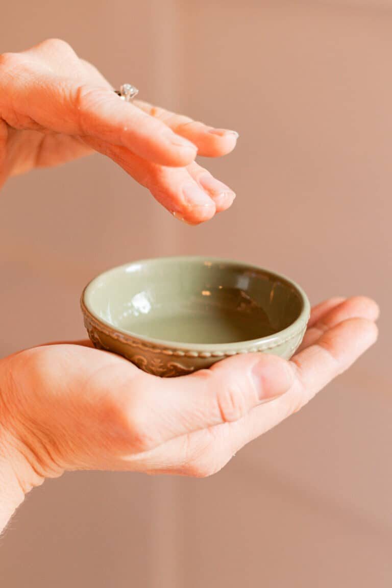 Dipping the tips of our fingers into the hair mask.