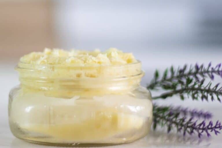 homemade magnesium lotion in mason jar with lavender sprigs