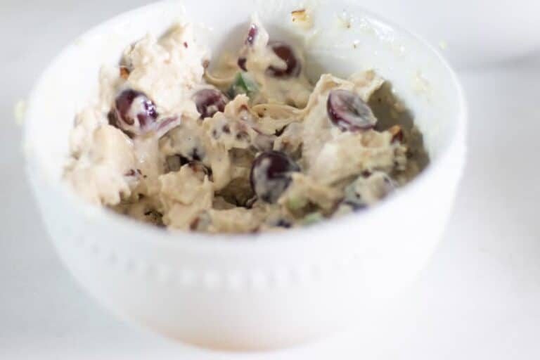 healthy chicken salad with avocado mayonnaise in white bowl