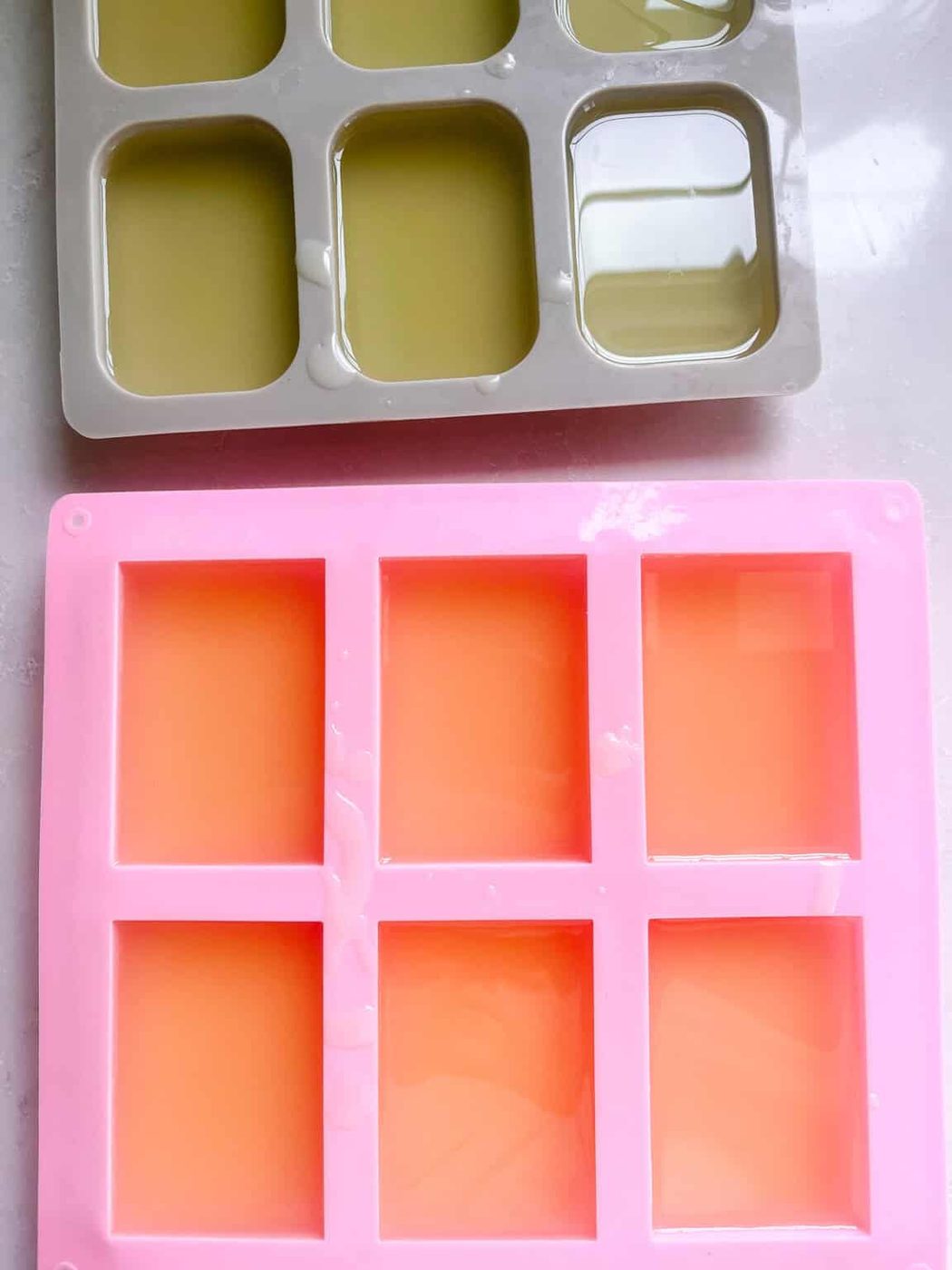 Conditioner bar mixture hardening in silicome molds.