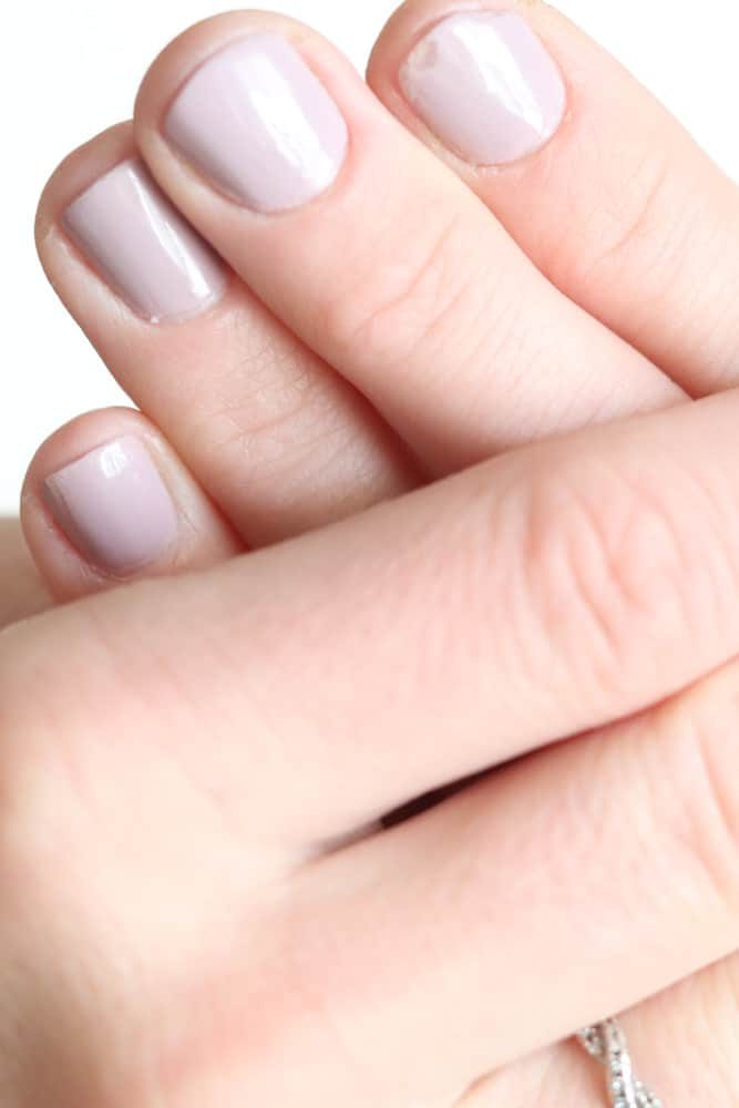 Hands with painted finger nails.