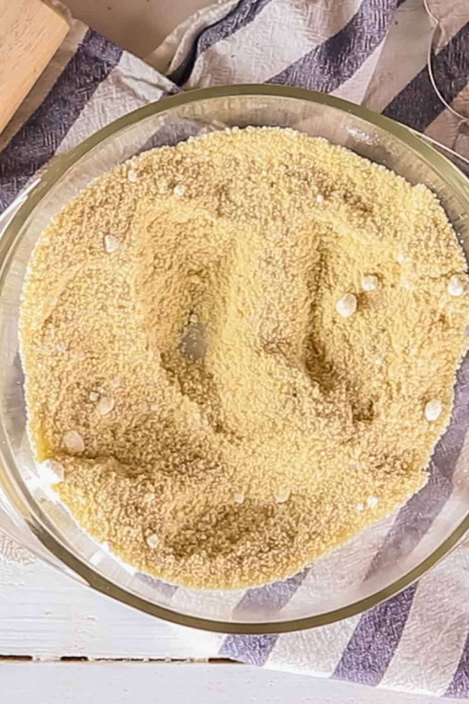 Dry ingredients in a glass mixing bowl.