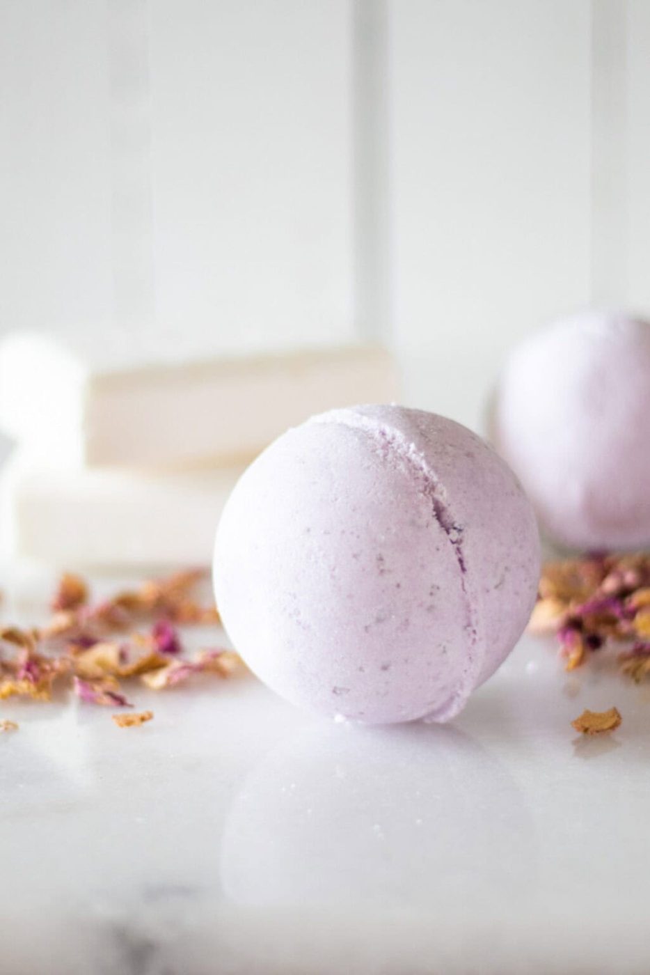 Popping the bath bombs out of the molds.