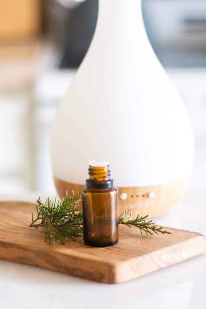 Siberian fir essential oil in front of diffuser
