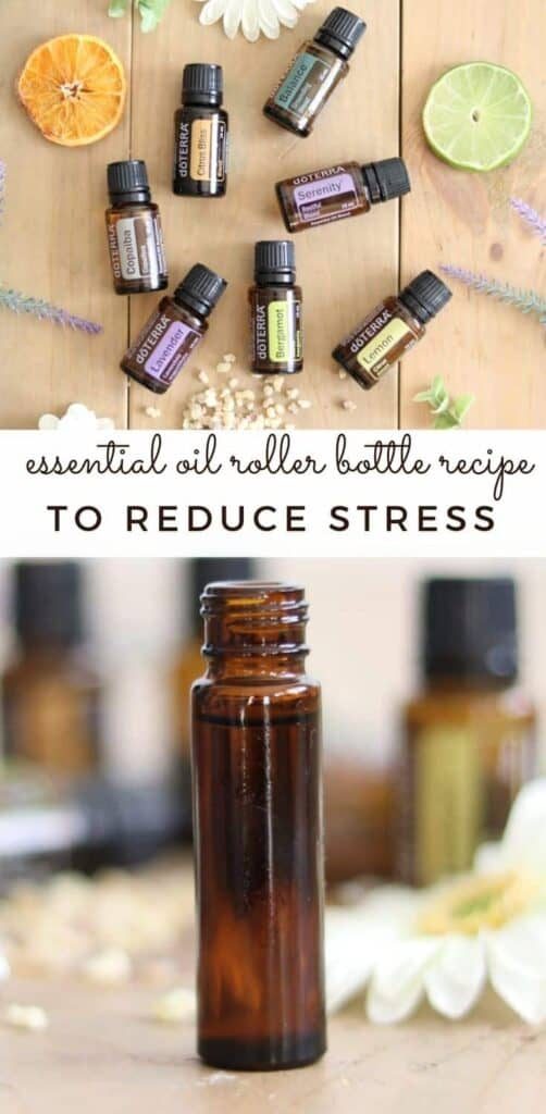 Calming essential oil roller bottle on a table with dried flowers.