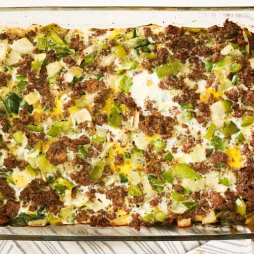 A sweet potato breakfast casseroles in a glass baking dish.