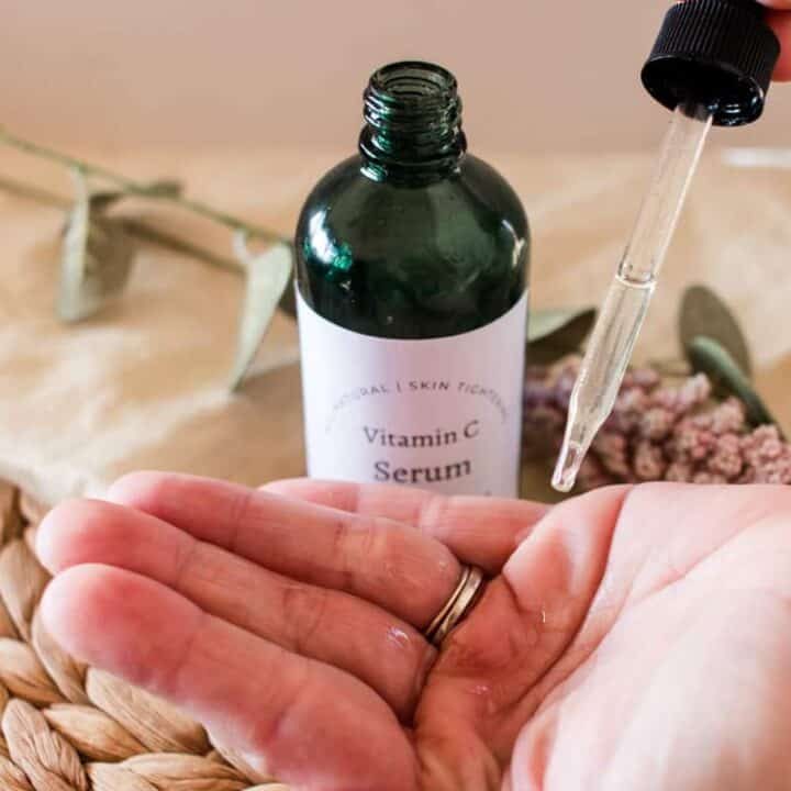 DIY vitamin C serum being warmed up in our hands.