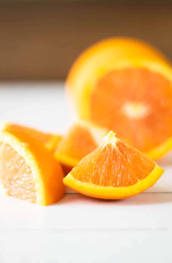 orange slices on white ship lap
