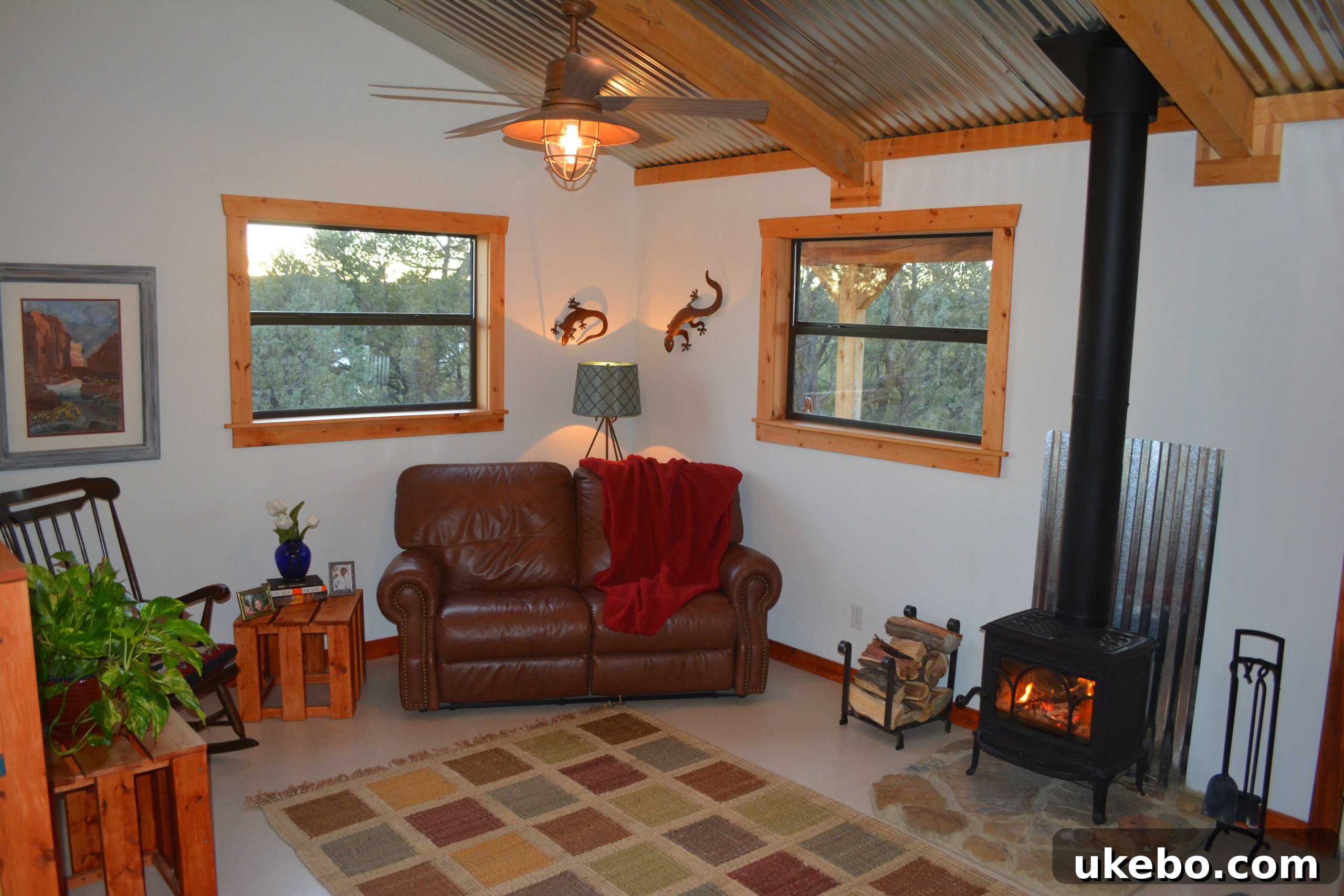 A charming front porch with a bistro table and swing, an ideal spot for enjoying sunsets