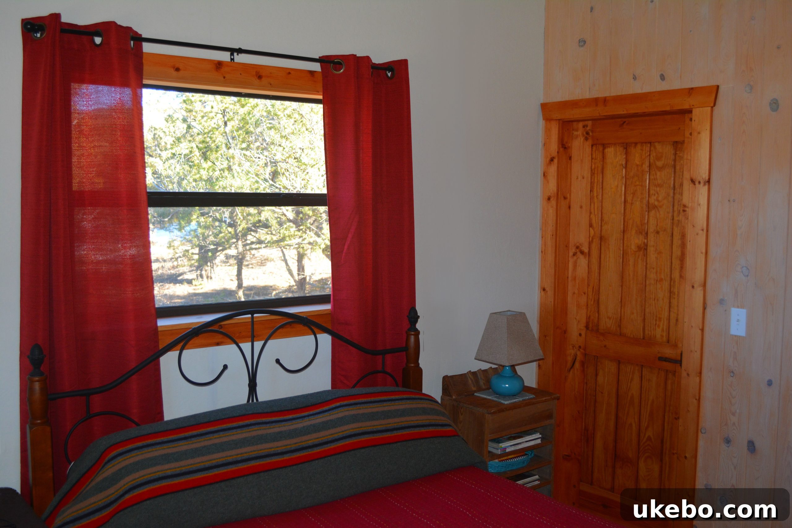 A detailed shot of handcrafted wooden elements, possibly a door or cabinet, adding character to the home